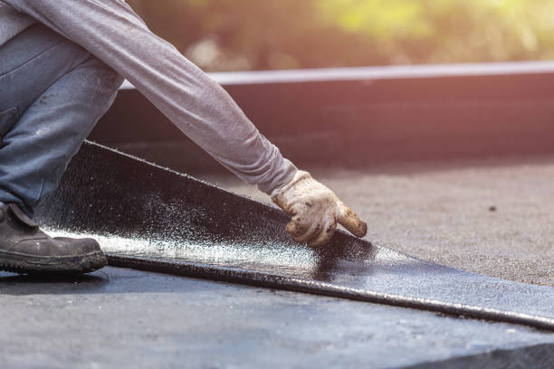Professional Waterproofing technician working in Andale, KS
